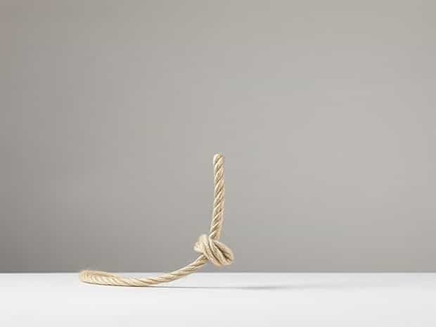 By Means Of A Rope Whose Mass Is Negligible